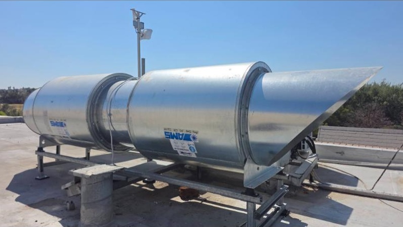 Large extraction fan and ducting on a rooftop