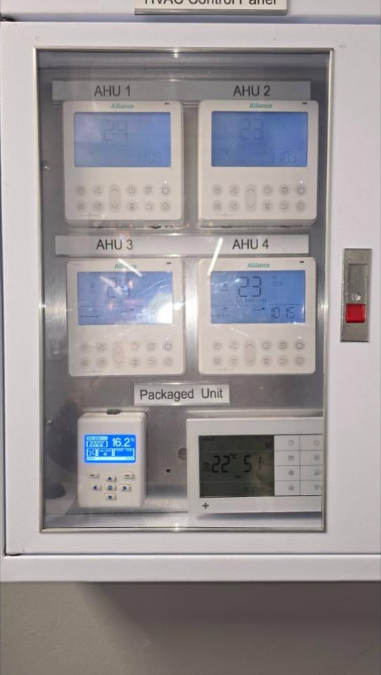 Bank of VRV controllers in a cabinet