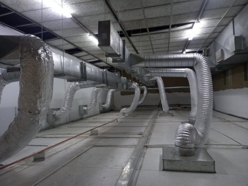 Ducting with flexible connections in a roof void