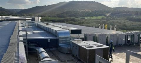 Rooftop plant and ducting on a large commercial building