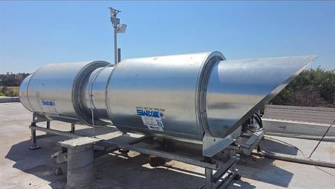 Large extraction fan and ducting on a rooftop