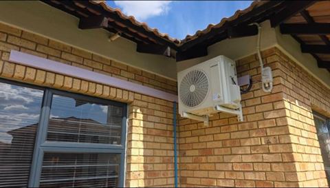Outdoor unit at the corner of a home
