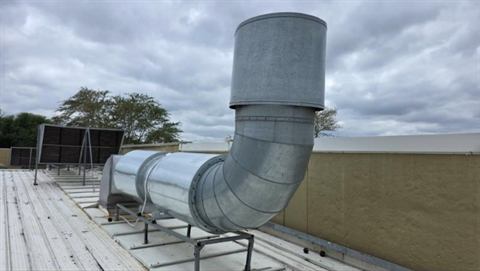 Rooftop extraction ducting with a vertical stack