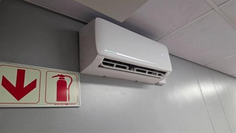 Wall-mounted split unit in a commercial space