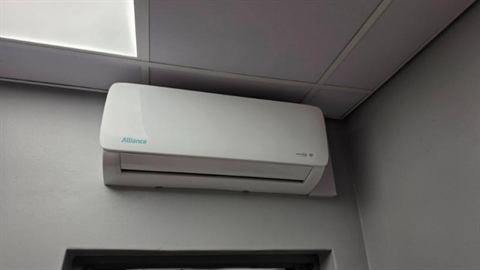Wall-mounted split unit in a commercial space