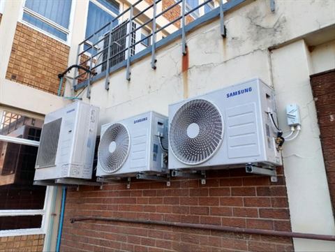 Samsung outdoor units on a wall