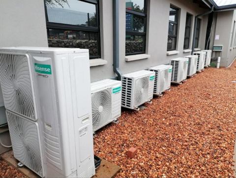 Hisense outdoor condensers on a gravel bed
