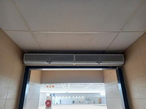 Under-ceiling unit above a serving hatch