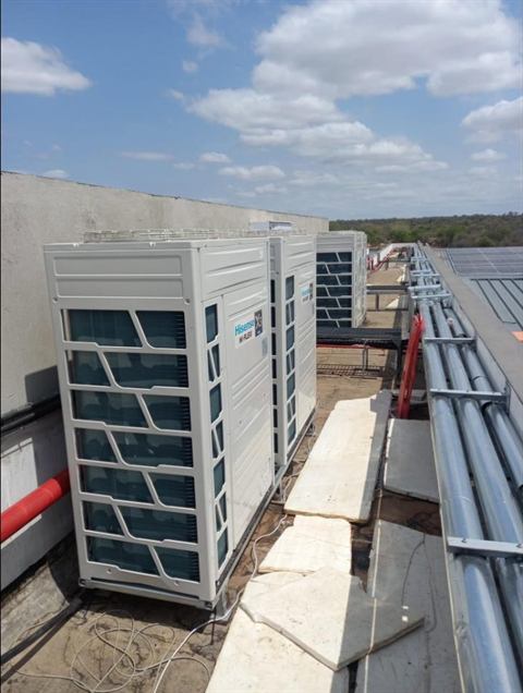 Row of VRF outdoor units along a rooftop