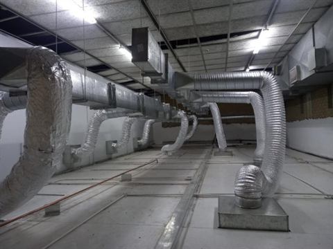 Ducting with flexible connections in a roof void