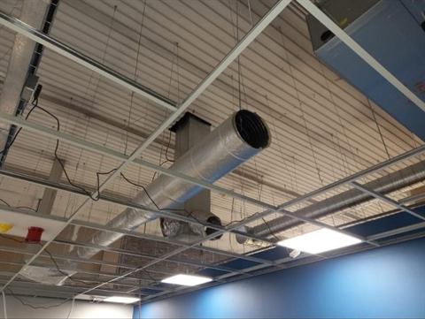 Spiral ducting above a suspended ceiling