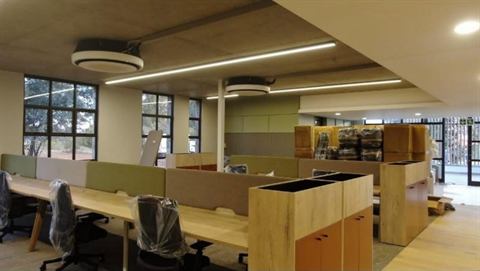 Finished open-plan office with ceiling diffusers