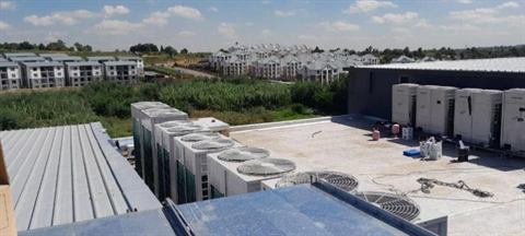 Rooftop plant overlooking a residential development