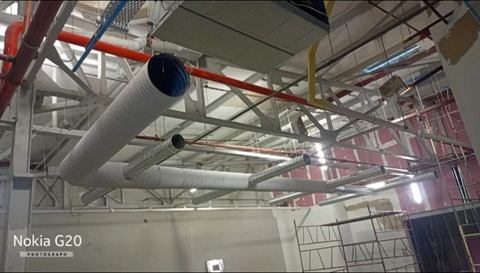 Spiral ducting in an industrial roof