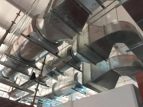 Ducting junctions in an industrial roof